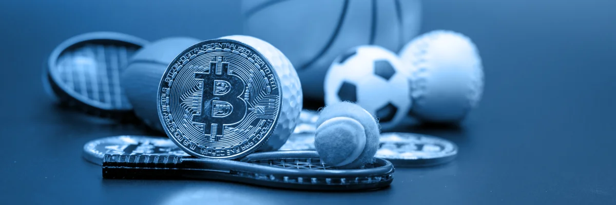Esports betting with crypto — Bitcoin coin surrounded by sports gear