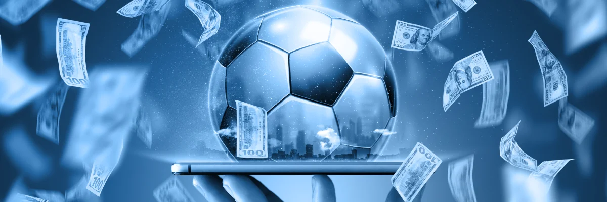 How to bet on soccer with crypto — glowing ball on a tablet with cash